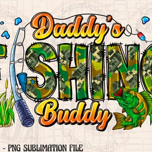 May include: A digital illustration of a fishing scene with the text "Daddy's Fishing Buddy" in a camouflage pattern. The illustration features a fishing rod, a fish, and green reeds.