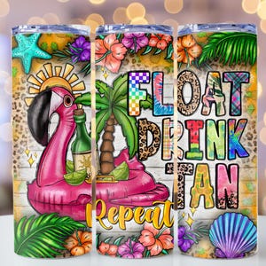 May include: A cylindrical tumbler featuring a tropical design with a pink flamingo float, a palm tree, a green bottle, lime slices, and seashells. The text FLOAT DRINK TAN REPEAT is printed in colourful, patterned block letters over a wood background.