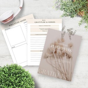 May include: A printable gratitude journal with a beige background and a floral design. The journal includes a section for bible study notes, a daily gratitude affirmation, and a scripture memory verse from Philippians.