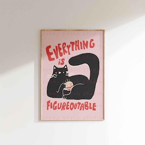 May include: A pink poster with a black cat holding a red cup. The text on the poster reads "Everything is Figureoutable".