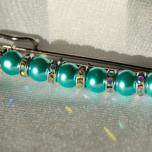 Aqua blue and crystal stock pin