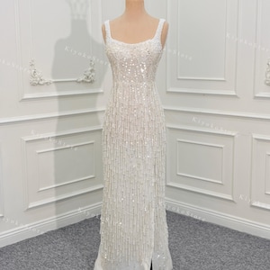 Fringe wedding dresses. Elegant evening dresses. Sparkling wedding dresses. Custom wedding dresses.