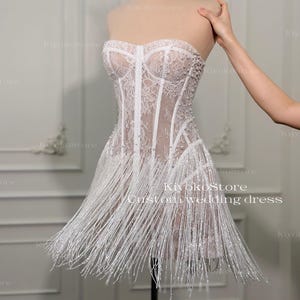 Party dresses. Fringe mini dresses. Sparkling reception dresses. Unique corset dresses.