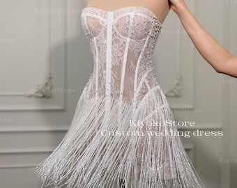 Vestidos de fiesta. Minivestidos con flecos. Vestidos de recepción brillantes. Vestidos de corsé únicos.