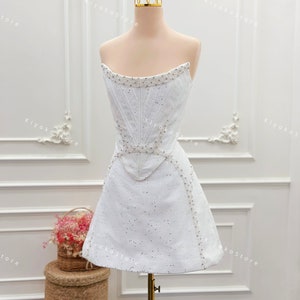 Short evening dresses. White party dresses. Short sparkly dresses. Reception dresses. Bridal dresses. Bachelorette party dresses.