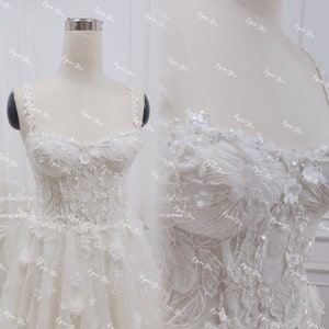 Wedding dress with laces. Wedding dress decorated with gorgeous 3D beads and flowers. Handmade wedding dress. Custom wedding dresses.