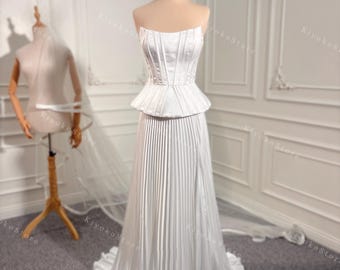 Corset wedding dresses. Pleated wedding dresses. Unique wedding dresses. Strapless wedding dresses. Custom wedding dresses.