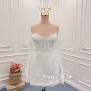 Lace wedding dress. Short wedding dress. Long sleeve wedding dress. Detachable sleeve dress. Corset dress. Classic wedding dress.
