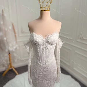 Romantic mermaid lace wedding dress. Beaded lace wedding dress. Unique corset wedding dress. Long sleeve wedding dress.