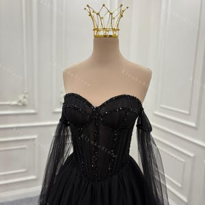 A-line wedding dress. Long sleeve wedding dress. Sexy black wedding dress. Beaded wedding dress.