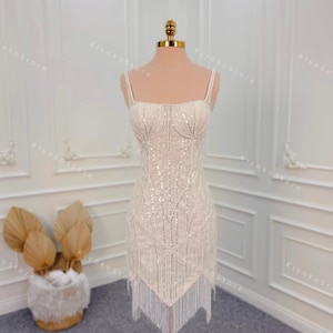 Short wedding dresses. Fringe wedding dresses. Gorgeous reception dresses. Unique wedding dresses. Luxurious party dresses.