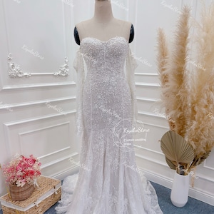 Luxurious beaded mermaid wedding dress.Custom wedding dress. Long sleeve wedding dress.