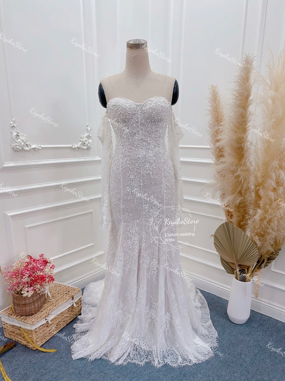 Luxurious beaded mermaid wedding dress.Custom wedding dress. Long sleeve wedding dress.