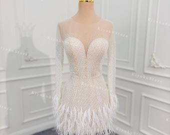 Wedding dress with handmade beads and feathers. Luxurious reception dress. Short wedding dress. Custom wedding dresses.