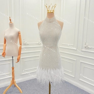 Bridal wedding dresses. Mini wedding dresses. Short wedding dresses. Beaded and feather wedding dresses.