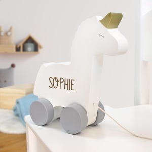 Unicórnio de puxar feito de madeira, brinquedo educativo personalizado com nome, presente de 1º aniversário