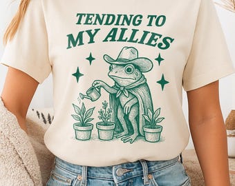Tending to My Allies Frog T-shirt. Funny Weirdcore Sayings Unique Tshirt Tee Adults Men Women Cowboy Frog Meme Graphic Sarcastic Plant Shirt
