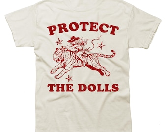 Protect The Dolls Shirt - Feminist T Shirt, Human Rights Shirt - 2000s Style Activist Slogan Tee, Feminism Cowgirl Riding Tiger Meme Shirt