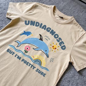Undiagnosed But I'm Pretty Sure - unisex t-shirt, funny dolphin meme mental health tee shirt, silly T-Shirt