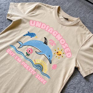 Undiagnosed But I'm Pretty Sure - unisex t-shirt, funny dolphin meme mental health tee shirt, silly T-Shirt