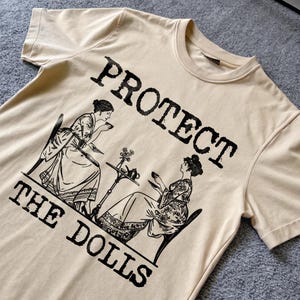 Protect The Dolls Shirt, Vintage Feminist Shirt, Human Rights shirt, Retro Cartoon T Shirt, Weird T Shirt, Meme T Shirt, Weirdcore T-Shirt