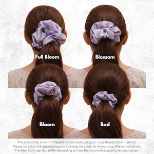 May include: Four light purple satin hair scrunchies of varying sizes labelled Full Bloom, Blossom, Bloom, and Bud. Each scrunchie is shown in a ponytail, demonstrating different volumes and fullness levels of the fabric gathered around the hair.