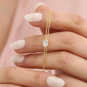 14K Solid Gold White Topaz Oval Bracelet: Elegant April Birthstone Jewelry