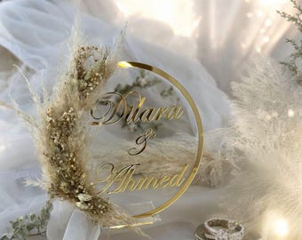 Isimlik name stand with flowers