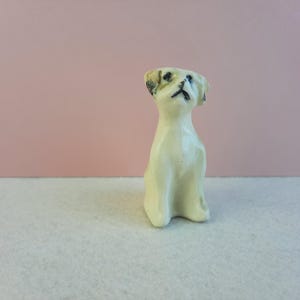 vintage pottery dog figurine, with terrier-like ears | ceramic ornament of sitting up dog with minimal facial definition yet so winsome