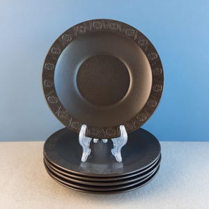 small dark brown "Concorde" plates with raised geometric designs | rare late 1960s tableware with striking space age design by Crown Ducal