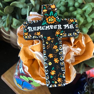 Recuérdame, cruz de caléndula