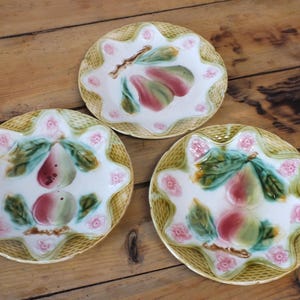 3 Antique barbotine plates decorated with pears and apples +