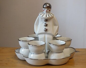 Expositor de huevos Pierrot 6 hueveras de porcelana Art Déco
