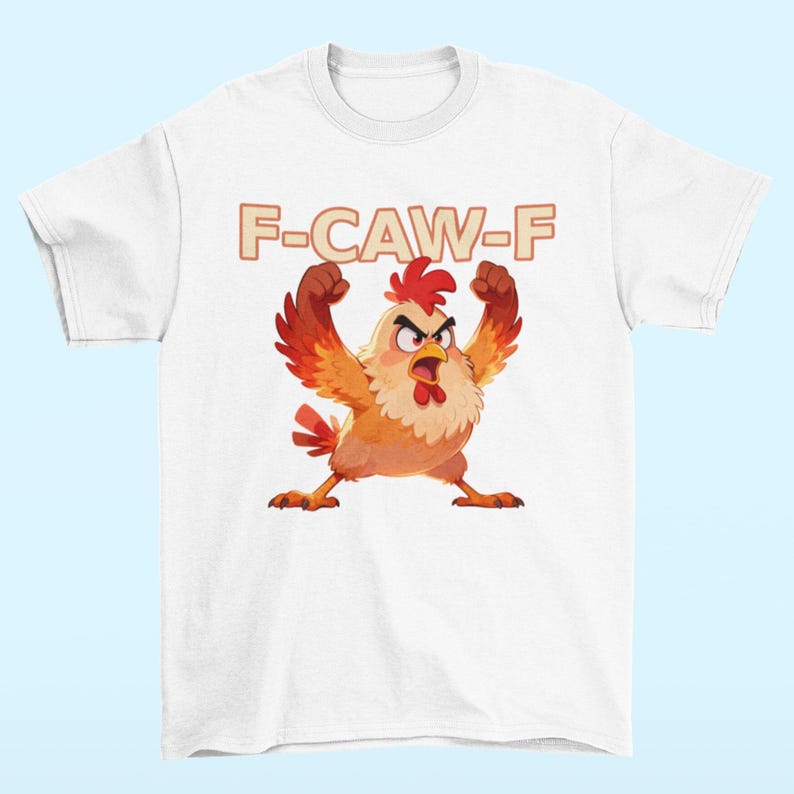 May include: White t-shirt featuring a cartoon chicken with raised fists and an angry expression. The text "F-CAW-F" is printed above the chicken in orange letters. The chicken is in shades of orange, red, and yellow.