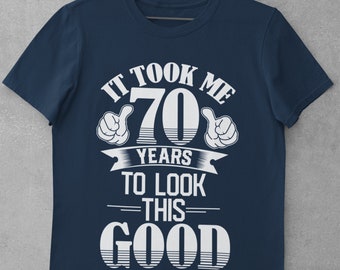 Funny 70th Birthday T Shirt It Took Me 70 Years To Look This Good in sizes small through 6xl with pointing thumbs design