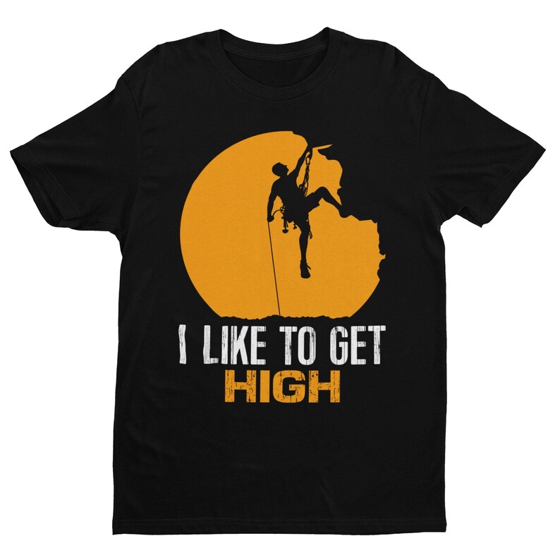 May include: Black t-shirt with a silhouette of a rock climber ascending a cliff face. The climber is silhouetted against a bright orange circle. The text "I like to get HIGH" is printed below the image.