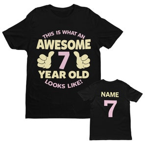 PERSONALISED Girls 7th Birthday T Shirt This Is What An Awesome 7 Year Old Looks Like with pointing thumbs design seventh gifts for girl