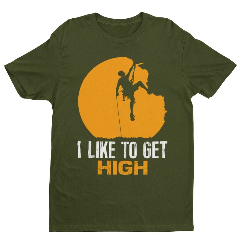 May include: A green t-shirt with a silhouette of a person rock climbing on a cliff face with a yellow sun behind them. The text "I like to get high" is printed in white on the shirt.