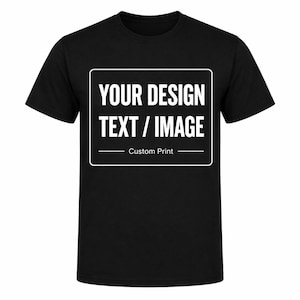 May include: A black short-sleeved t-shirt featuring a white rectangular graphic on the chest. The graphic contains the text "YOUR DESIGN TEXT / IMAGE" in a bold sans-serif font, with the words "Custom Print" centred below it.