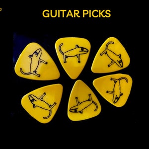 Guitar Picks, Yellow Dog Guitar Picks, Guitar, Music Lessons, Guitar Lessons, Music Theory, Songwriting
