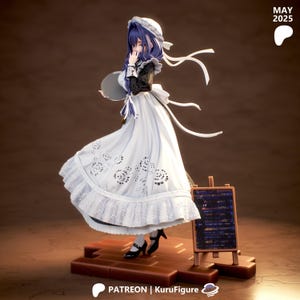 May include: A detailed figurine of a maid in a white dress with black accents, holding a tray. The figure has blue hair and wears a white cap. A small chalkboard on a wooden easel is to the right. The text "MAY 2025" is visible.