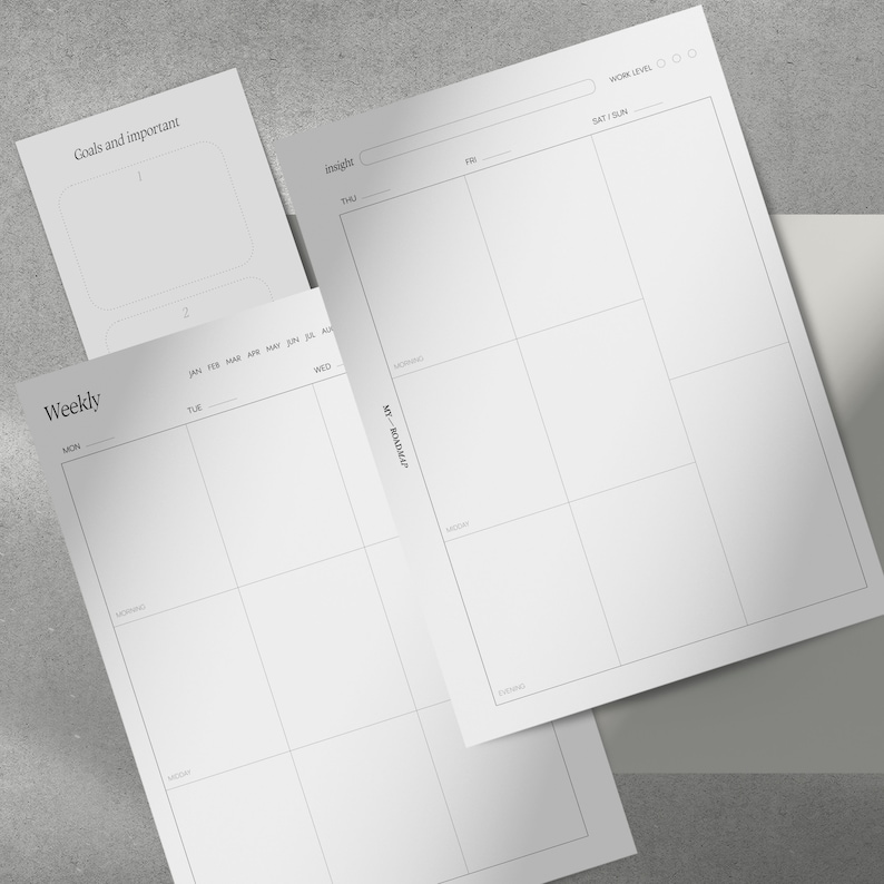 May include: A collection of white planner pages with black grid lines and text. The pages include sections for weekly planning, goals, and daily insights. Text includes "Weekly", "Goals and important", and "My Roadmap".