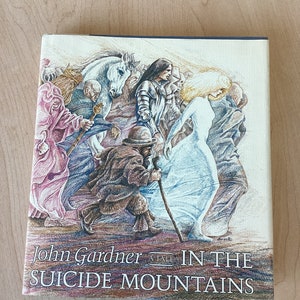A Tale In The SUICIDE MOUNTAINS By John GARDNER 1977 Vintage First Edition Hardcover Upstate N Y Fairy Tale Novel Very Good