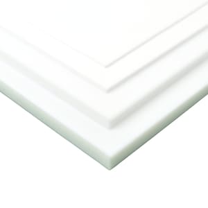 May include: A stack of four white foam boards, each with a smooth, matte surface. The boards are arranged in a slightly offset manner, revealing their thickness and creating a layered effect. The edges are clean and sharp.