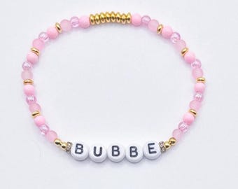 ピンク＆ゴールドの「ブッベ」ブレスレット：ユダヤ人のおばあちゃんへの贈り物