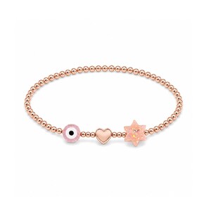 May include: Rose gold beaded bracelet featuring a pink evil eye charm, a heart charm, and a pink star charm. The bracelet is strung on an elastic band.