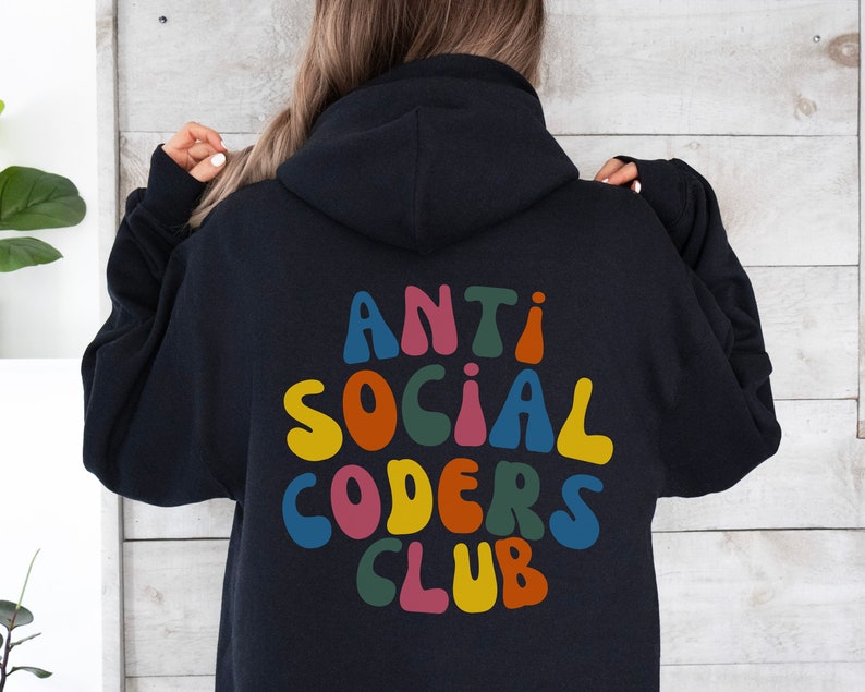 May include: Black hoodie with a colourful graphic on the back that says "Anti Social Coders Club".