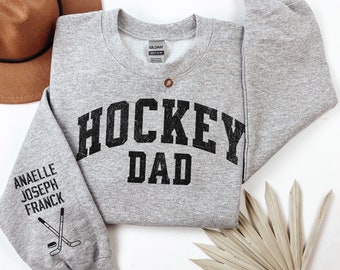 Custom Hockey Dad Mom Sweatshirt With Kids Name On Sleeve,Gift For Hockey Dad Shirt,Personalized Hockey Hoodie Sport Dad,Father’s Day Gift