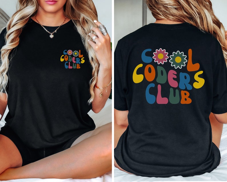 May include: Black t-shirt with a retro-style graphic that says "Cool Coders Club" in colourful letters with flowers.
