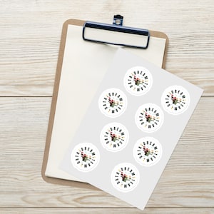 May include: Eight round stickers with a white background and a colorful design. The design features a group of people with the words "Dream Team Data" written around them.